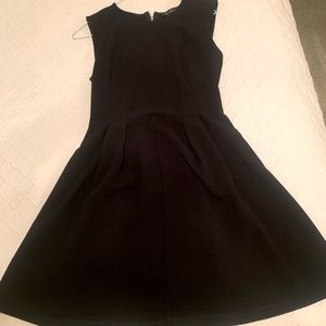 Simple little black dress. Fitted top with flare. Dynamite, worn twice.